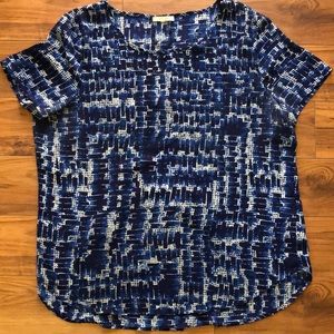 Woman’s blue and white blouse. Size Large